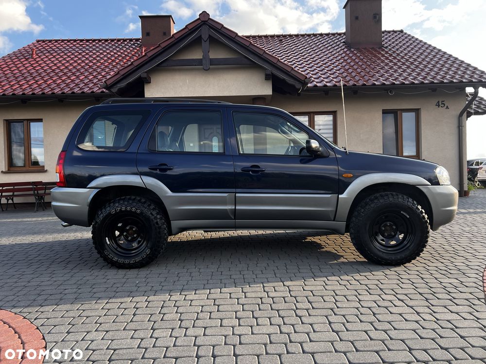Mazda Tribute - 3