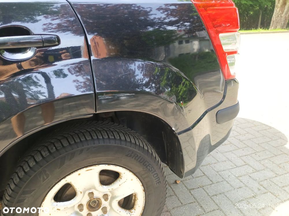Suzuki Grand Vitara 2.0 - 7