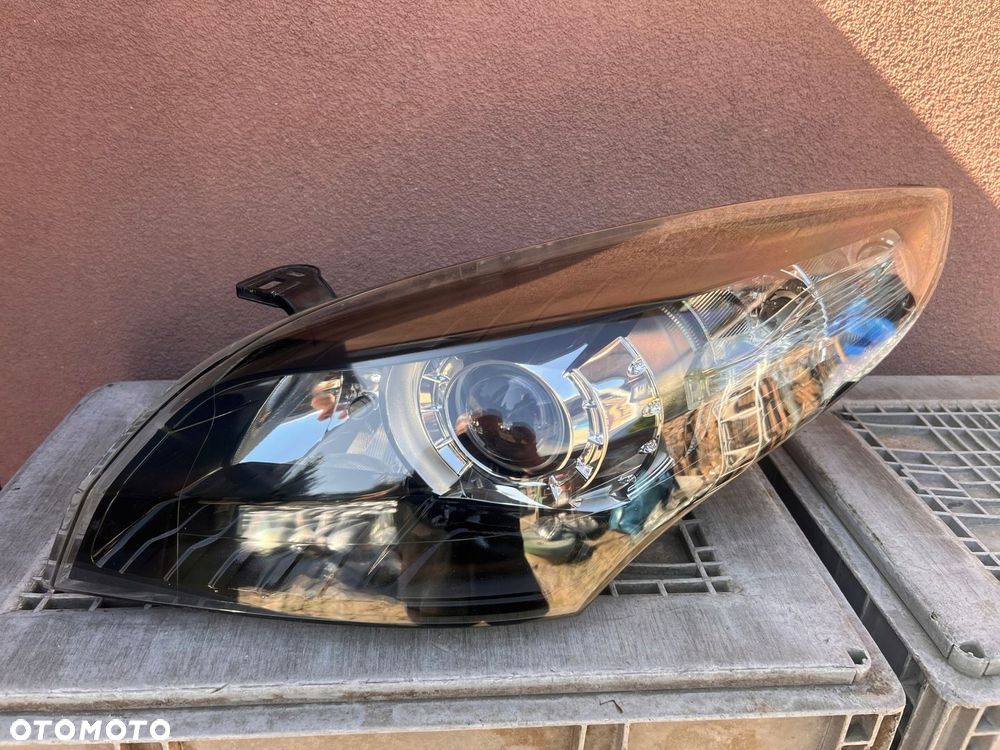 Lampa przednia RENAULT MEGANE III XENON LEWA CZARNA EUROPA ORYGINALNA AL - 1