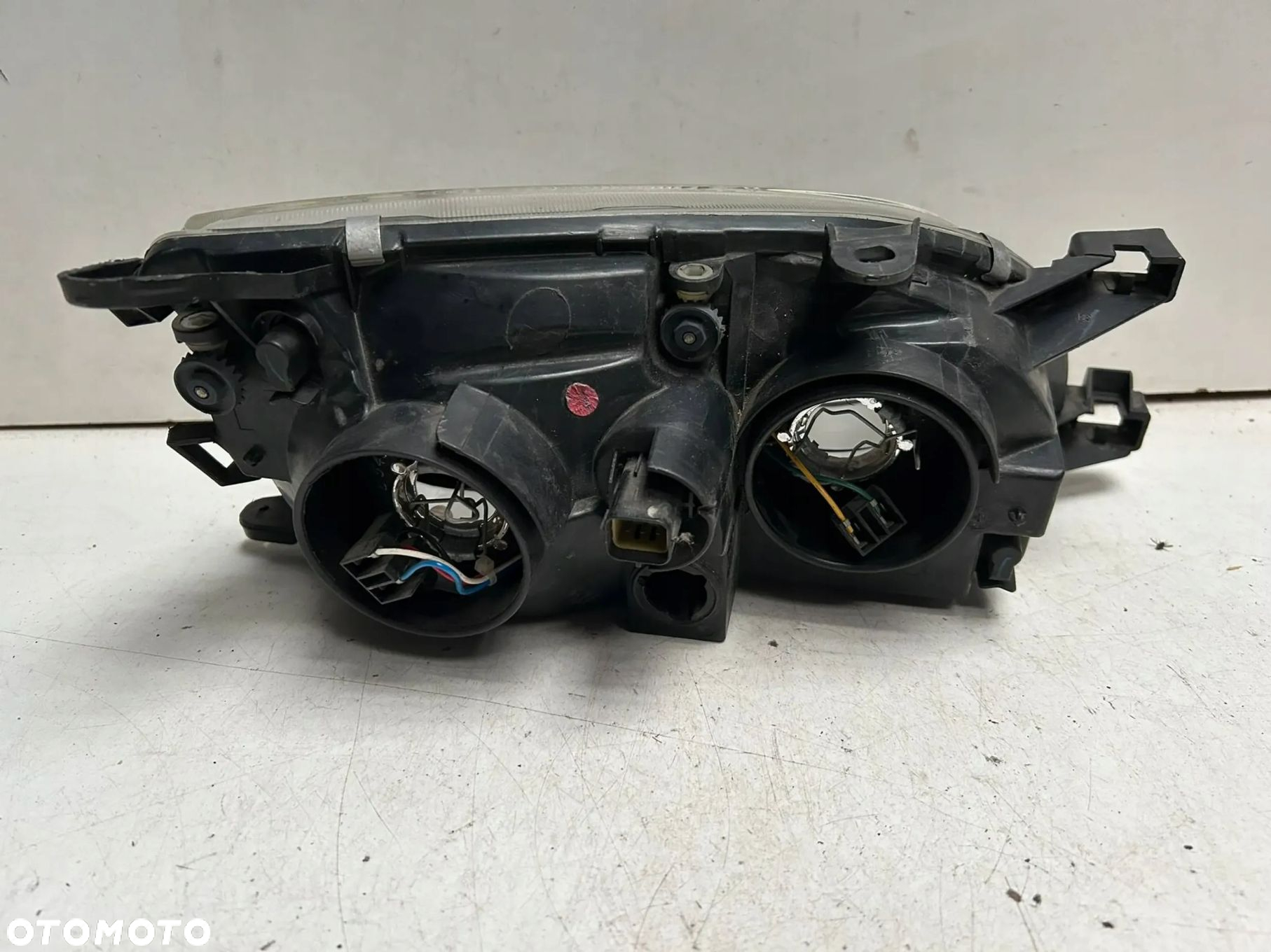 Reflektor lewy Toyota Avensis T22 - 2