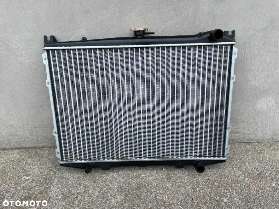CHŁODNICA WODY NISSAN PICK UP, KING CAB D21 86-- NOWA 2,4i12V - 1