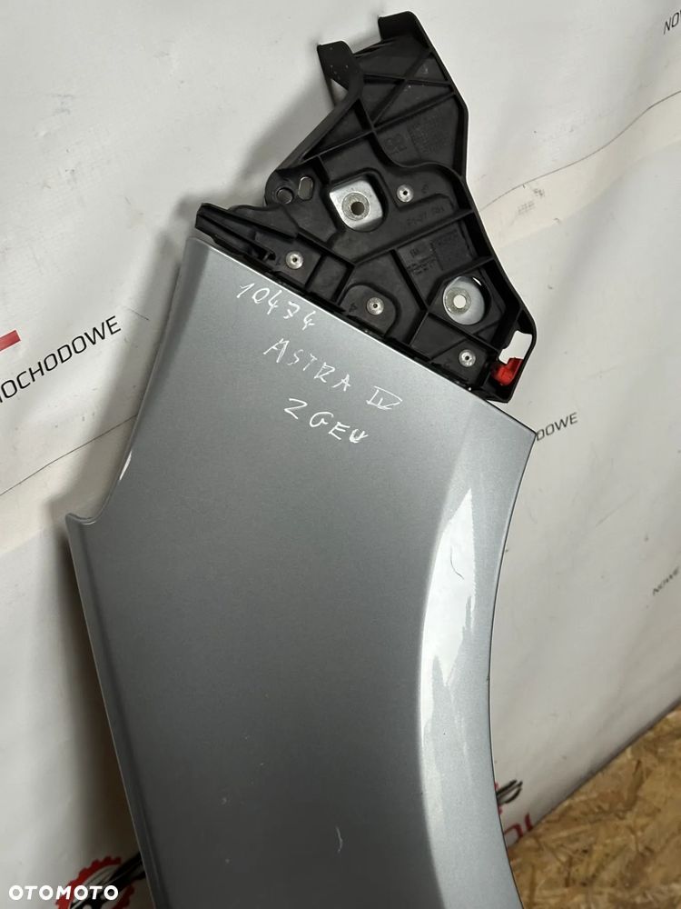 BŁOTNIK PRZEDNI PRAWY OPEL ASTRA IV  ZGEV - 2