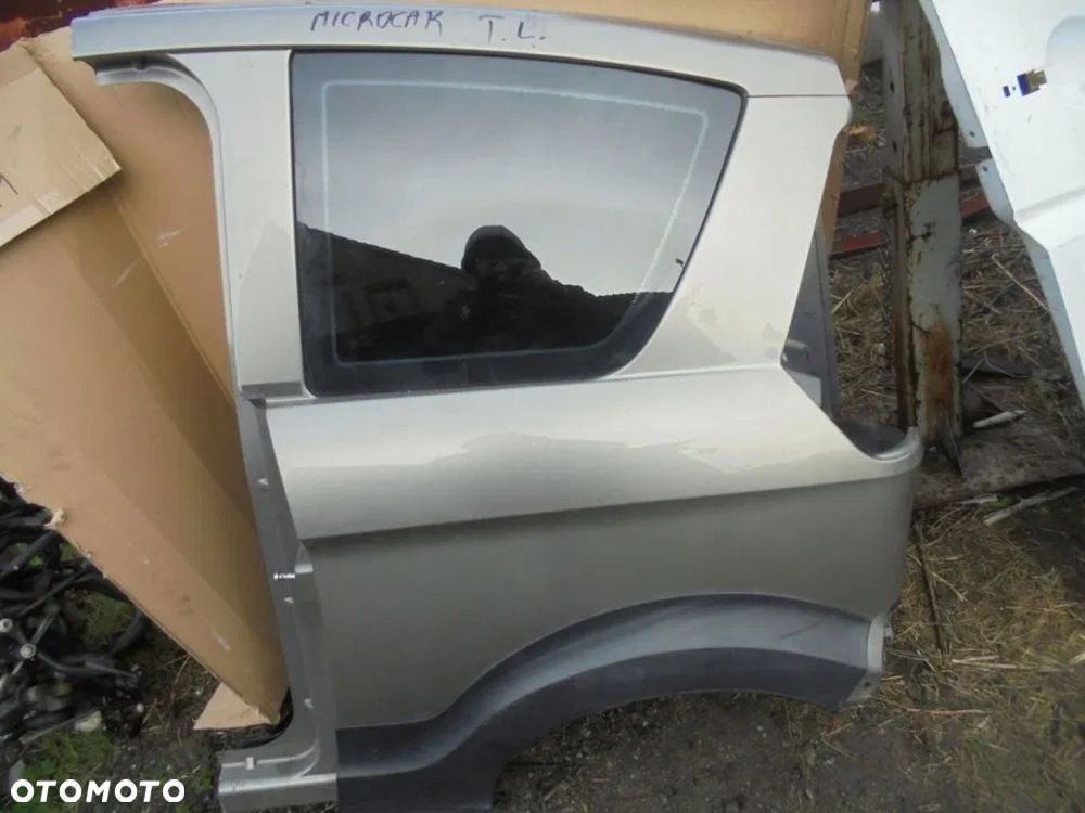 MICROCAR M.GO MGO SZYBA LEWY TYŁ - 1