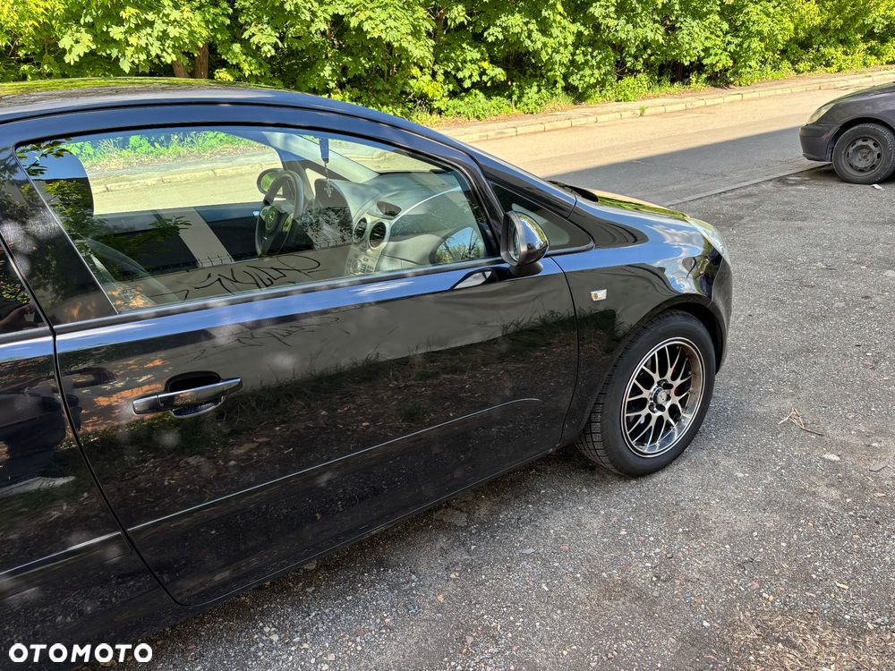 Opel Corsa 1.2 16V Cosmo - 4