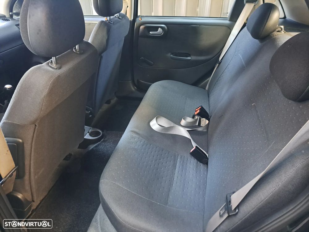 Opel Corsa 1.2 16V Enjoy - 6