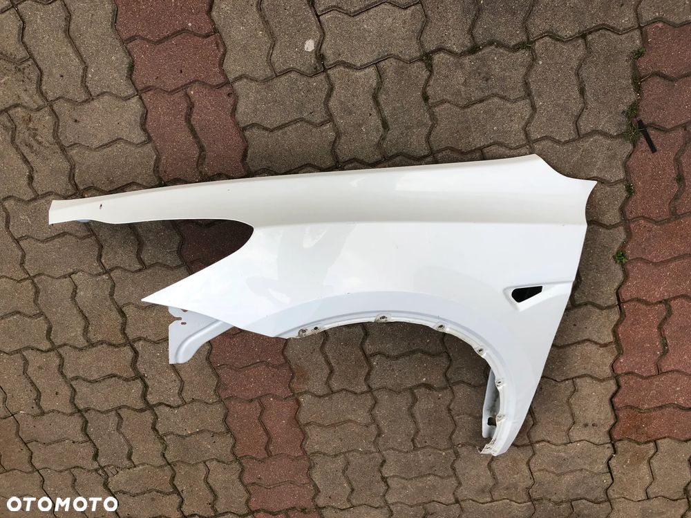 TESLA Y MODEL Y BŁOTNIK PRZEDNI LEWY