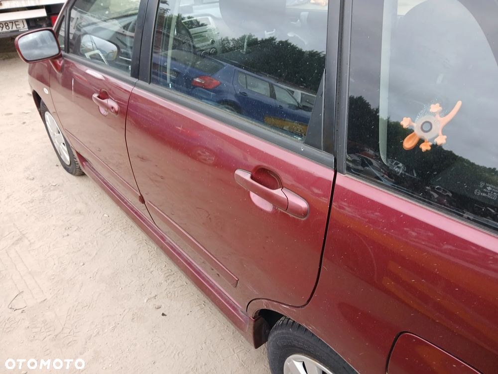 SUZUKI LIANA D31 fotel fotele kanapa deska kokpit podsufitka boczek boczki klamka podłokietnik - 9