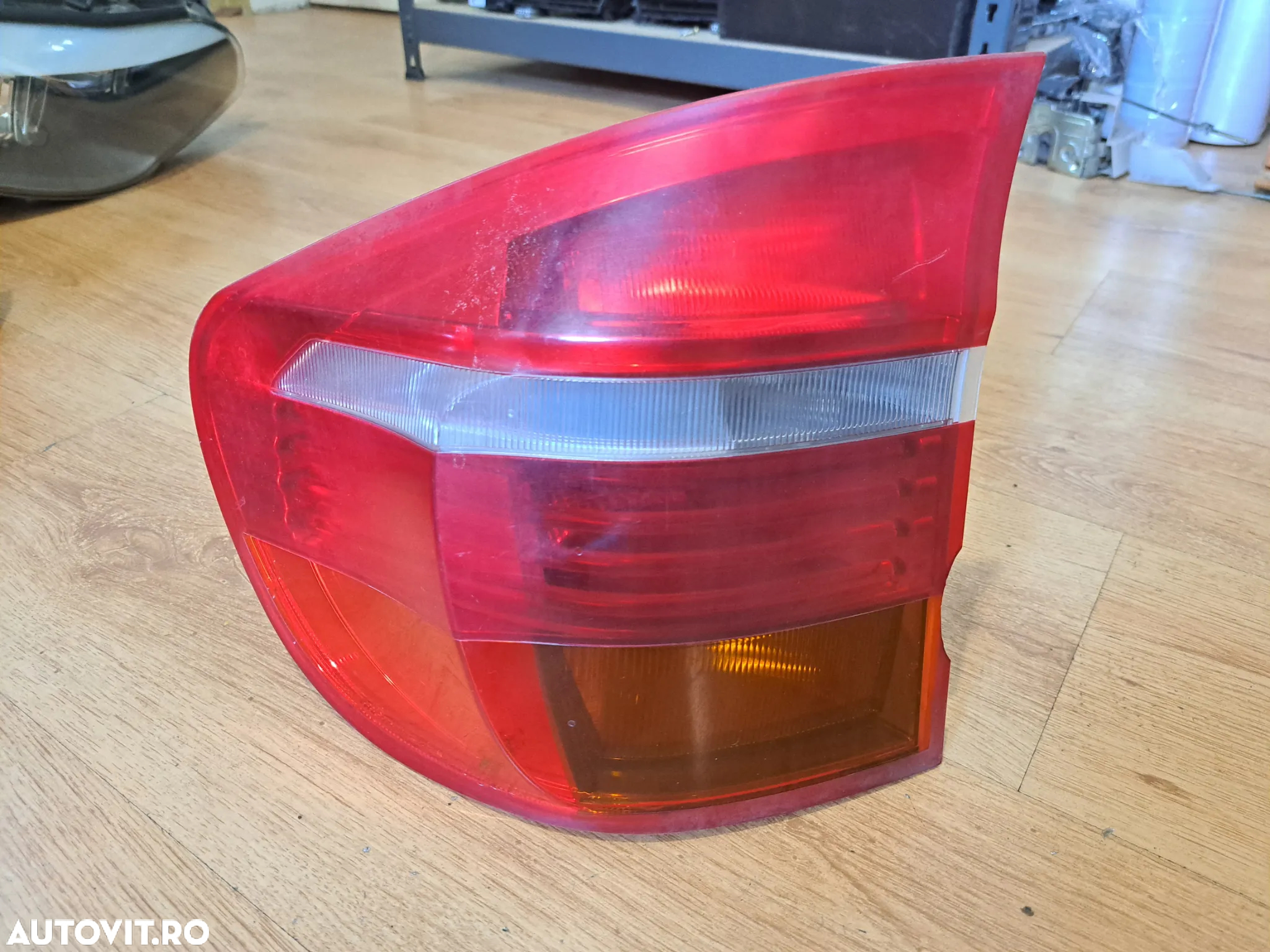 Stop tripla lampa stanga dreapta aripa caroserie semnalizare marsarier original BMW X5 E70 - 2
