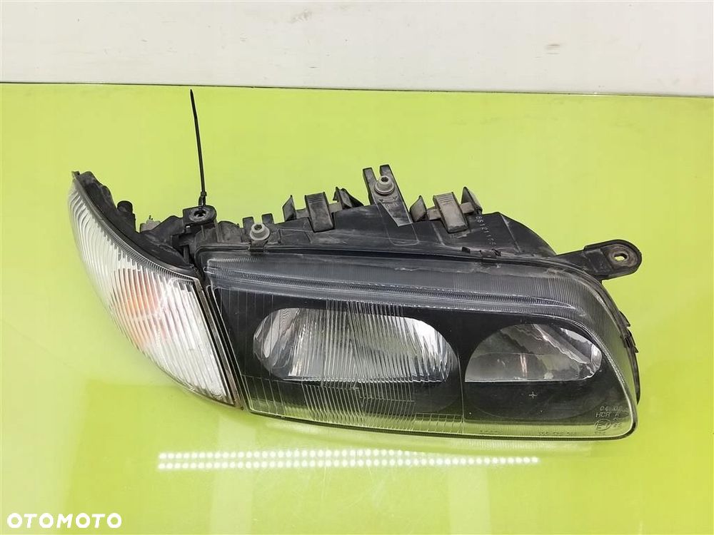 Reflektor lampa przód prawa Mazda 626 V 1997-2000 PRZED LIFT 1305623044 - 9