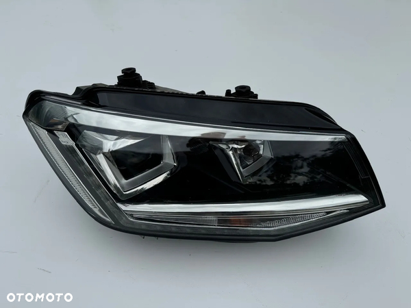 Reflektor Xenon lampa przednia 2K1951032B VW CADDY 2K strona prawa