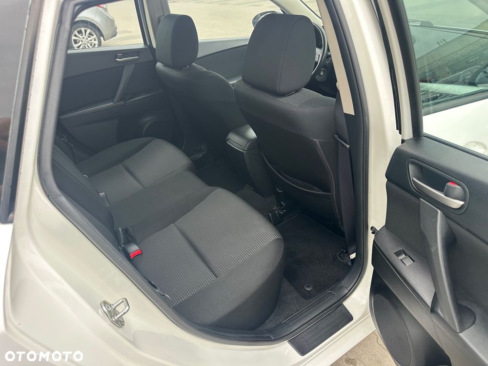 Mazda 3 2.0 Exclusive + - 10