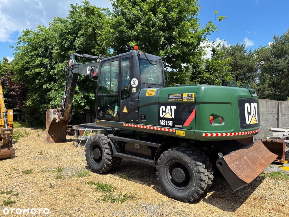 Caterpillar M315D rok 2013r 14mtg ZEPPELIN GERMANY - 1