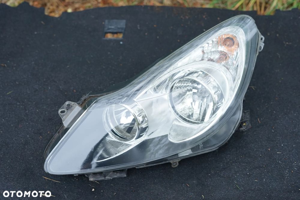 Lampa przód przednia lewa Opel Corsa D 93189363 Anglik - 1
