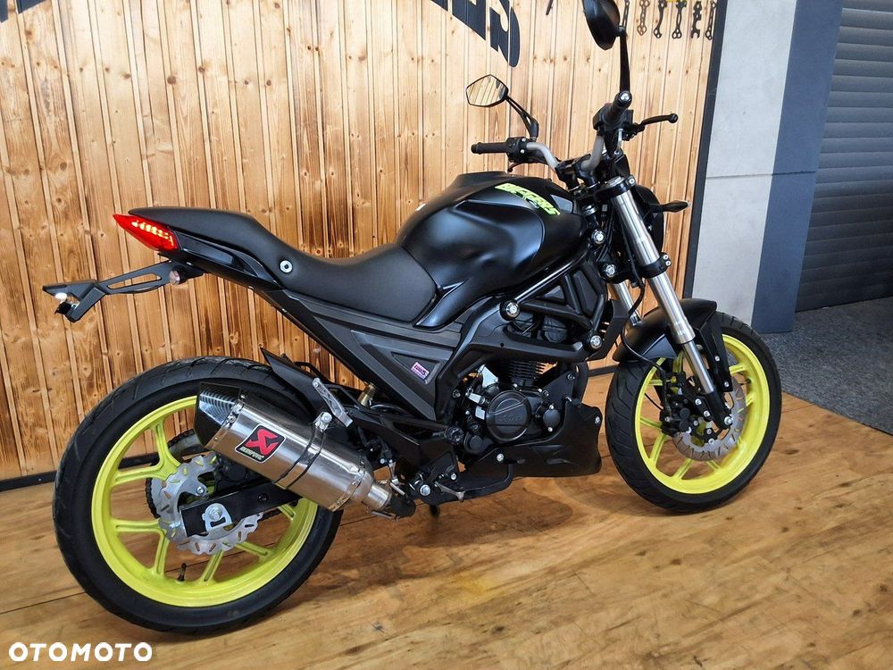 Moto Magnus Inny - 18