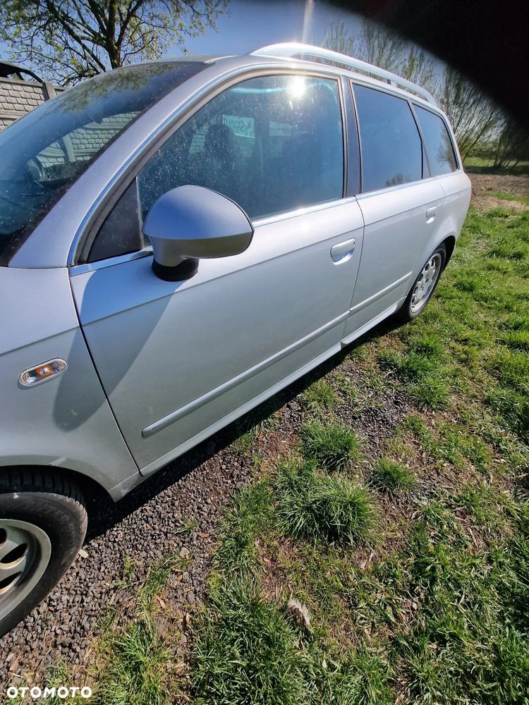 Drzwi  lewy  przód  seat exeo  w kolorze  LX7W - 1