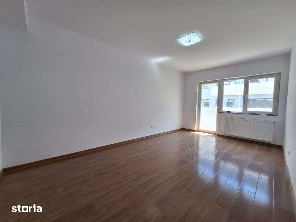 Apartament cu 3 camere, 55 mp, balcon, zona Terra — fotografia 2