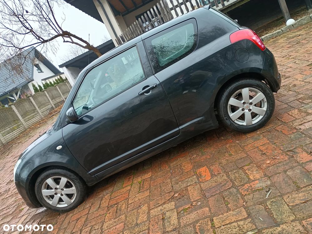 Suzuki Swift 1.3 DDiS Comfort - 14