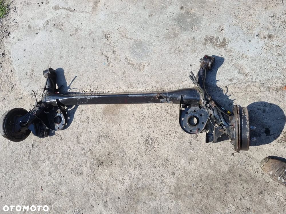 Belka zawieszenia tył tylna YARIS II III 2 3 bęben ITALIA - 2