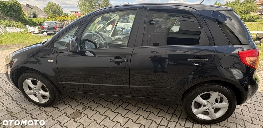 Suzuki SX4 1.6 GLX / Comfort - 7