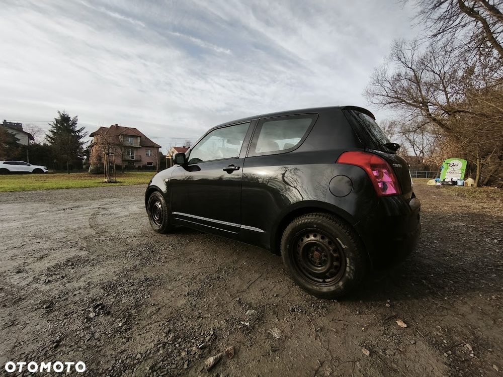 Suzuki Swift 1.3 Club - 6