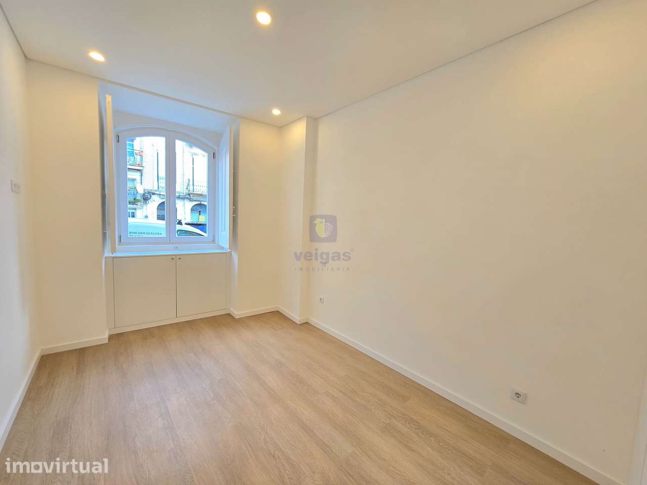 Apartamento T2 com terraço com duas frentes ao nível do RC no empreend - Grande imagem: 5/20