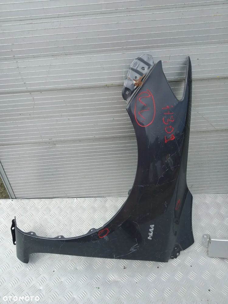 F354/F357/F371/F680/F748/H309/H327/H351/H501 BŁOTNIK LEWY TOYOTA COROLLA E15 SEDAN - 12