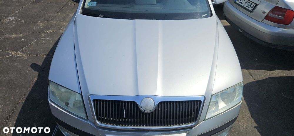 SKODA OCTAVIA II  04-08 1.9 TDI BKC - OSLONA PRZECIWSLONECZNA LEWA PRAWA - 8
