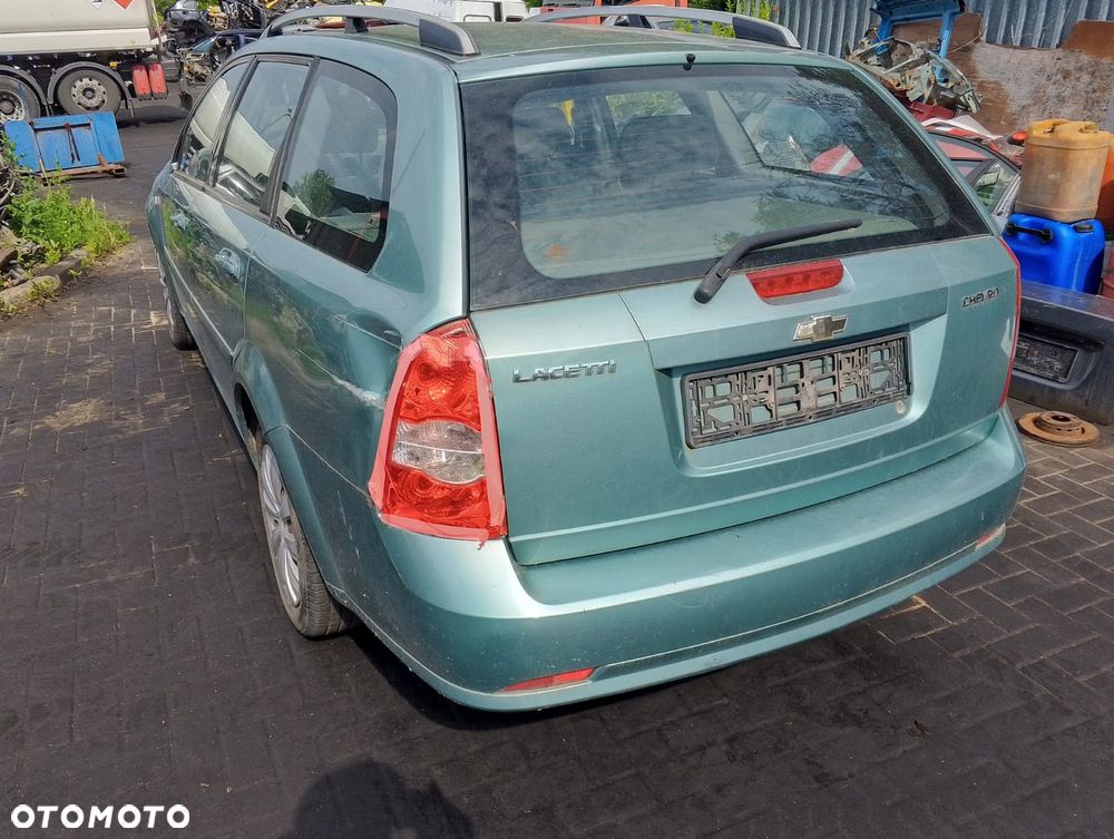 Chevrolet Lacetti I (03-09r.) 1.6 B 108KM. Silnik F16D3 Skrzynia EMG.Cały na części.GWARANCJA !!! Przód Tył Zestaw Komplet Drzwi Klapa Zderzak Błotnik Maska Grill Atrapa Szyba Pas Lampa Lusterko Boczki Fotel Kanapa Kokpit Deska Rozdzielcza Przełącznik Włącznik Sterownik Przewody Wiązka Instalacja Moduł Komputer Czujnik Listwa Pompa Alternator Wtryski Głowica Rozrusznik Kompresor Sprzęgło Dwumas Silnik Skrzynia ABS Klimatyzacji Paliwa Wspomagania Kolektor Turbina Przepustnica Zawór Chłodnica Koło Hak Belka Sanki Zawieszenie Mcpherson Półoś Amortyzator Wydech Tłumik Zacisk Most - 4