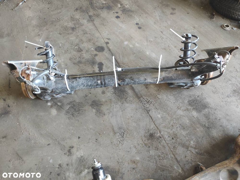 BELKA OŚ ZAWIESZENIA TYŁ BĘBNY Z ABS FIAT PANDA II ID: 239020 - 4