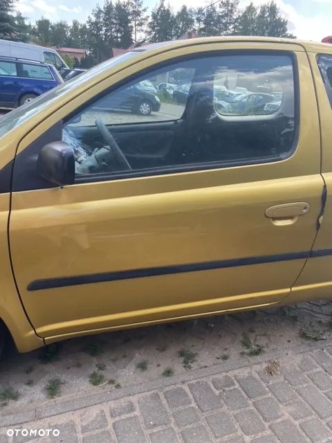DRZWI LEWE PRAWE TOYOTA YARIS I 580 - 1