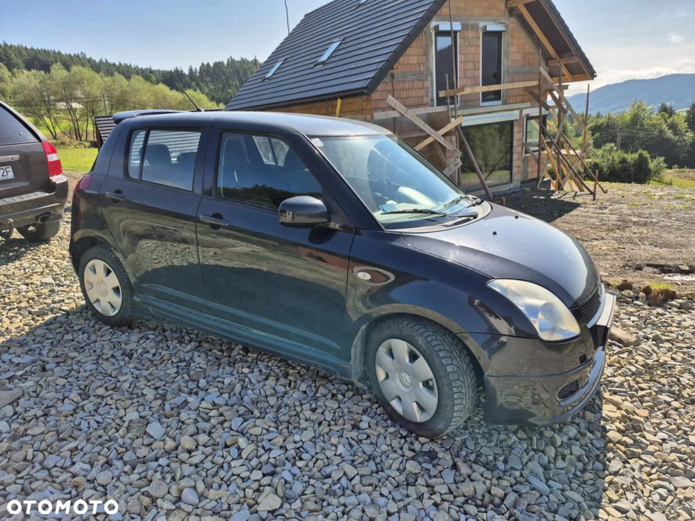 Suzuki Swift 1.3 4x4 Comfort - 1