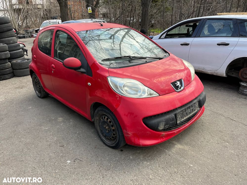 Dezmembrez Peugeot 107 rosu 2007 1.0 benzina 4usi - 2