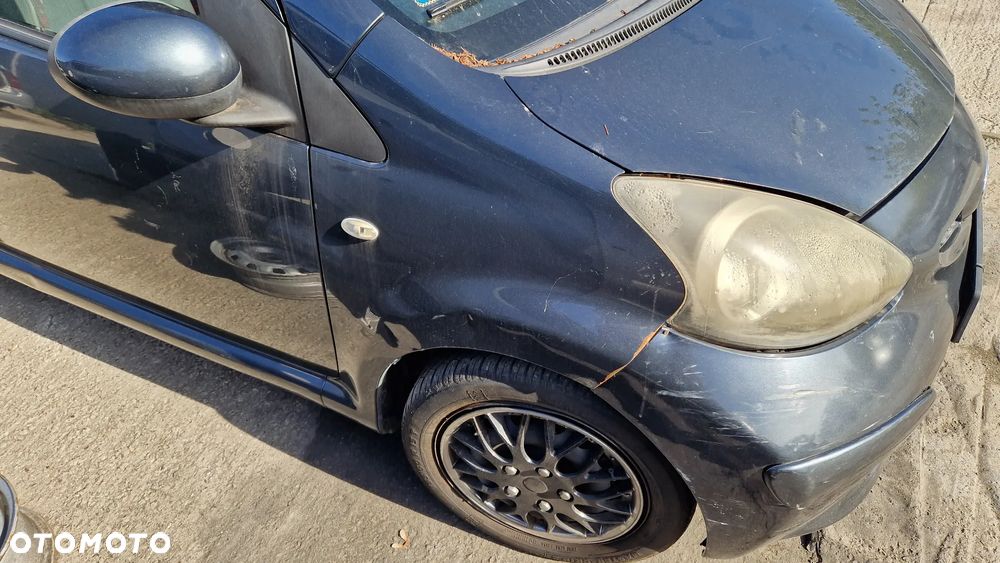 TOYOTA AYGO 05-14 ZDERZAK PRZÓD 1E0 - 3