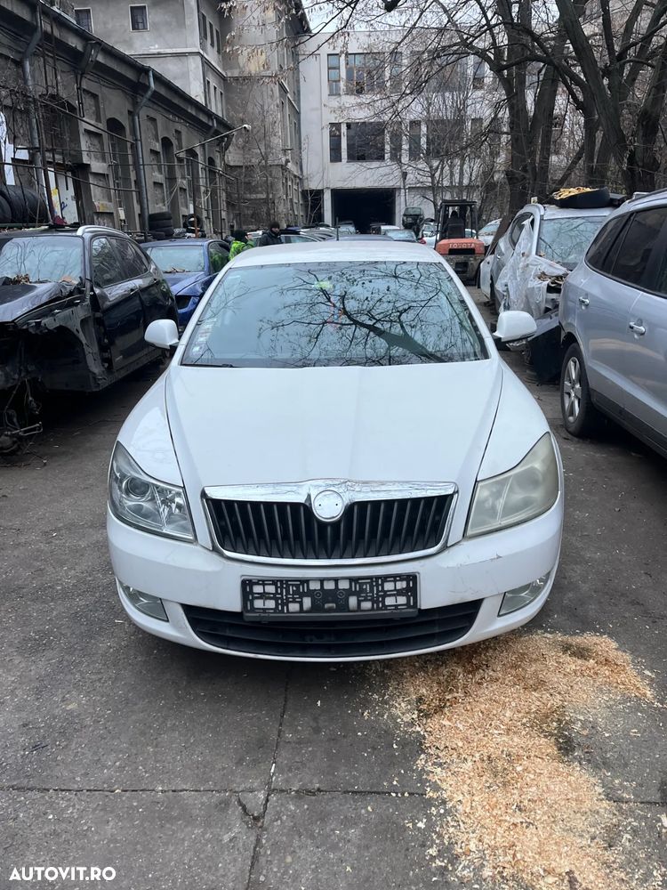 Far stanga cu lupa si halogen Skoda Octavia 2 facelift 2012 - 3