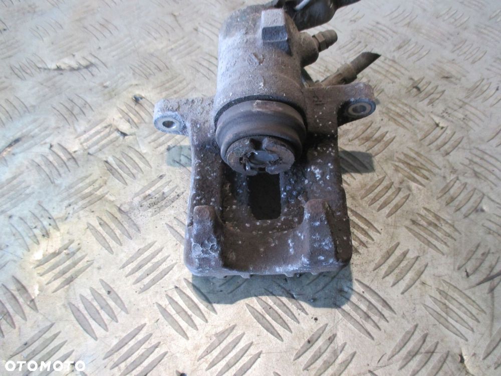 SEAT LEON II ZACISK HAMULCOWY TYŁ PRAWY TYLNY 1.9TDI - 3