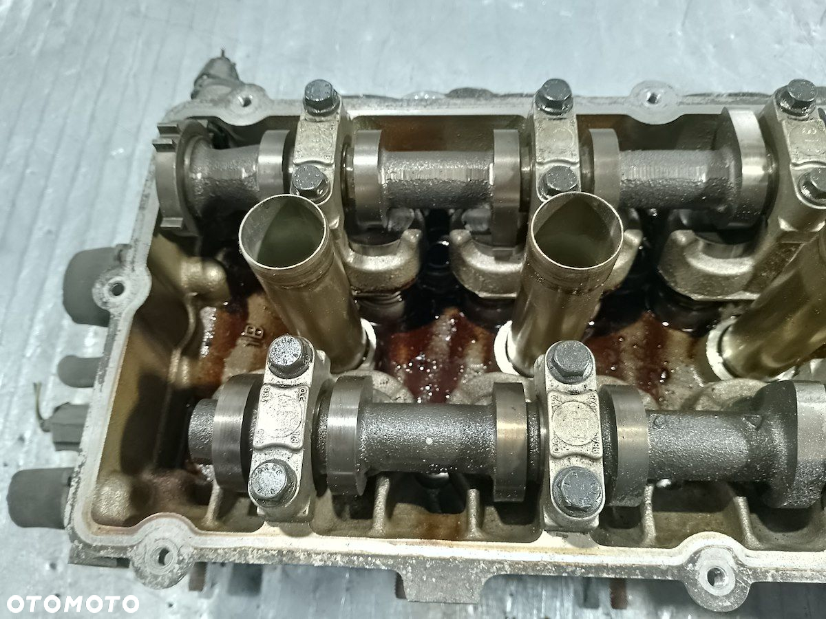 GŁOWICA MITSUBISHI COLT VI MN155155D  MN155155E 1.3 - 11