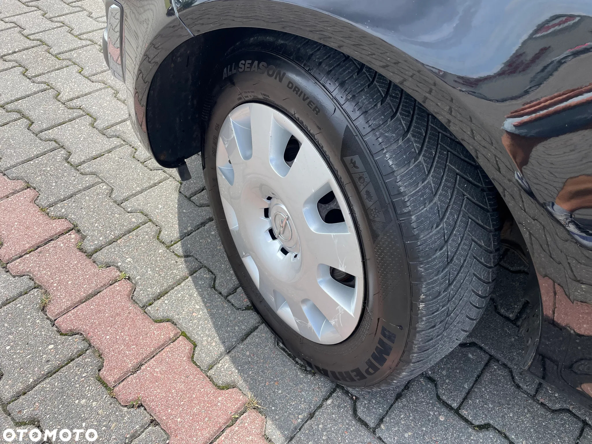 Opel Corsa 1.4 16V Enjoy - 23