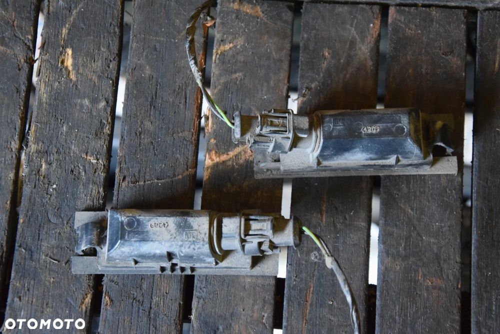 Opel Astra J Oświetlenie lampki tablicy rejestracyjnej