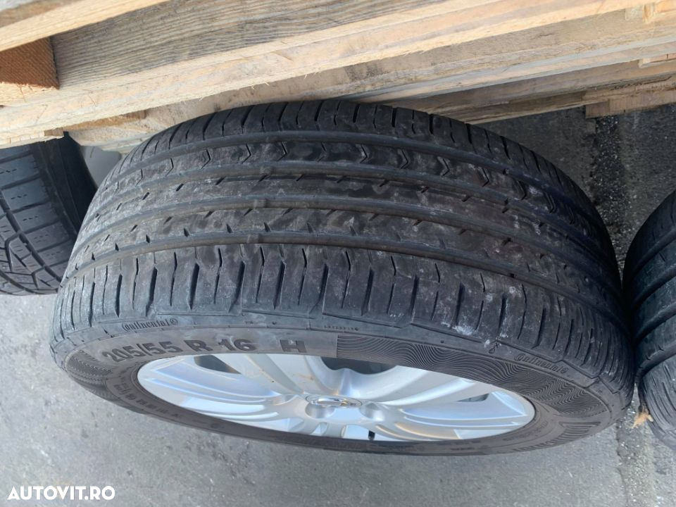 Set de jante cu cauciuc pentru Opel Astra H/Zafira B, 205/55R 16H, cod 0P026K7 - 2