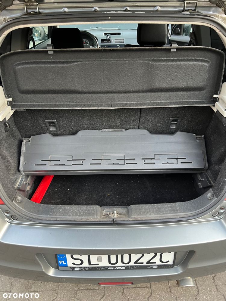 Suzuki Swift 1.3 Club - 13