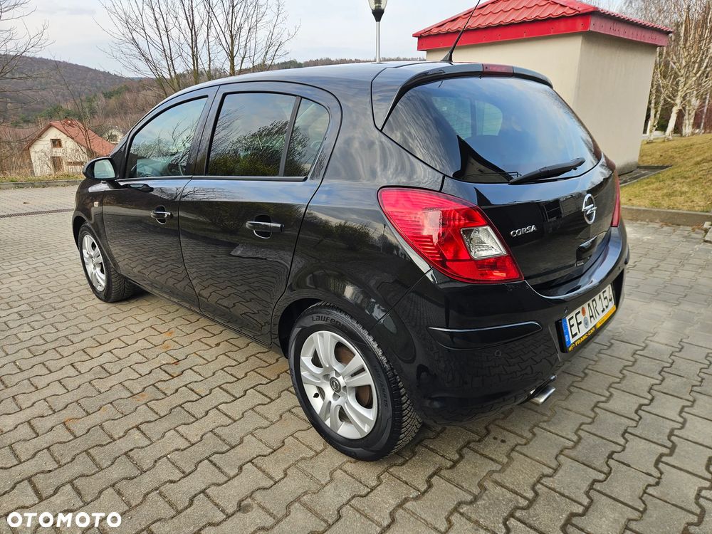 Opel Corsa 1.4 16V Active - 17