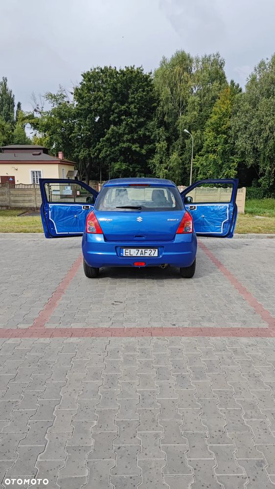 Suzuki Swift 1.3 Club - 8