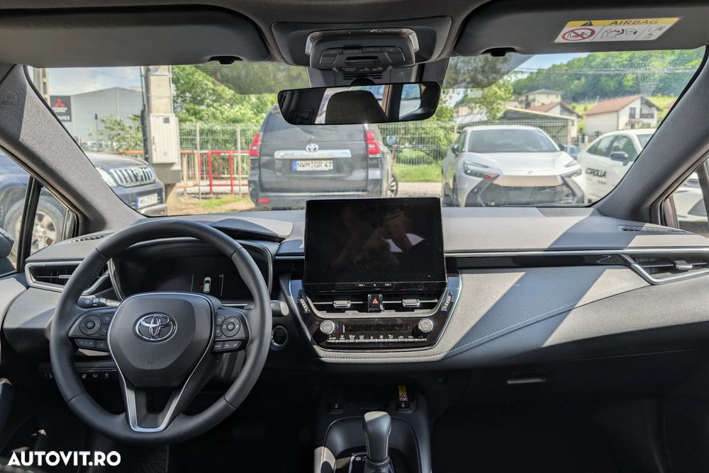 Toyota Corolla 1.8 HSD Business - 10