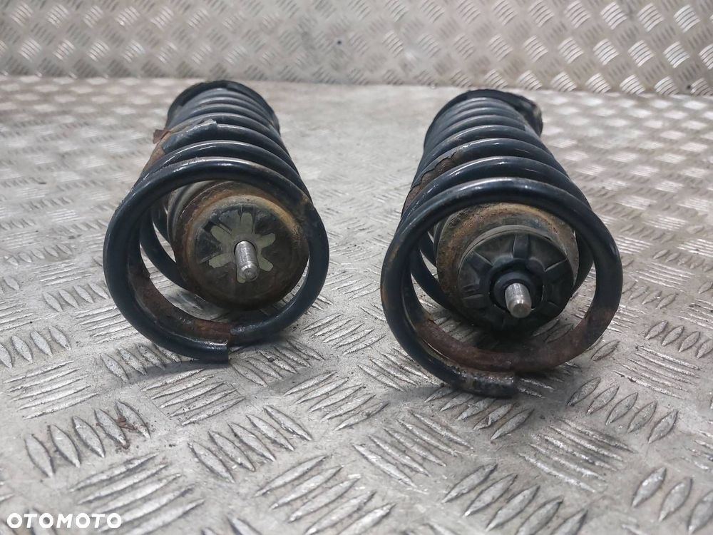 AMORTYZATOR + SPRĘŻYNA LEWY TYŁ + PRAWY TYŁ MAZDA DEMIO I D27828700C - 6