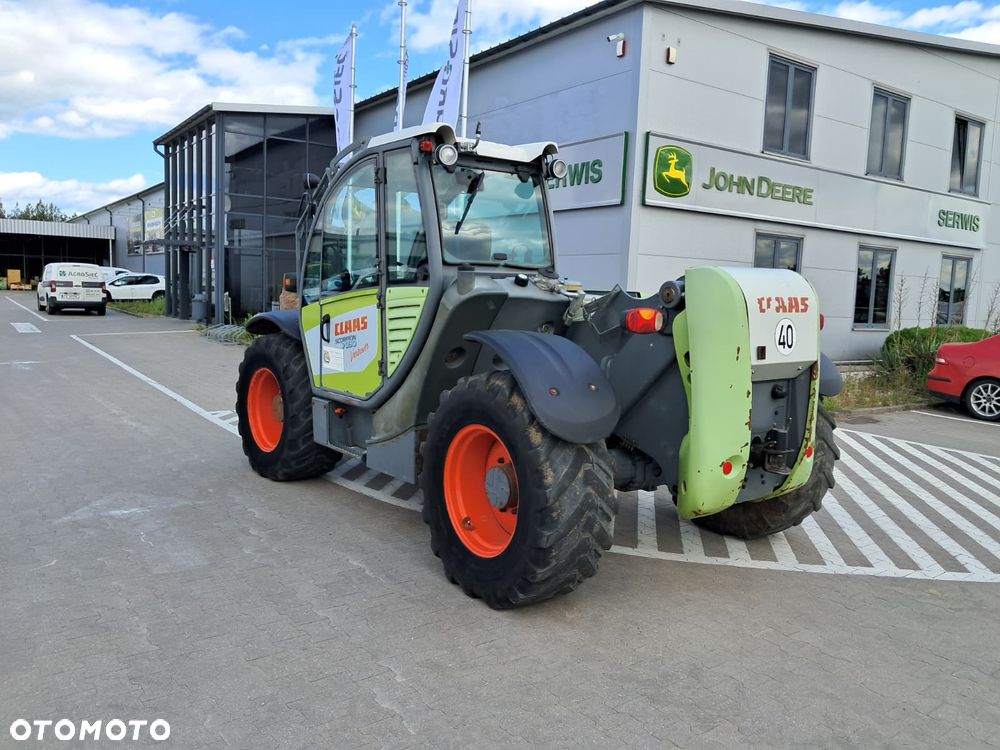 Claas Scorpion 7030 - 11