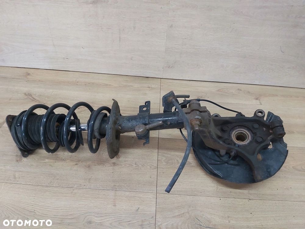 Nissan Qashqai II J11 mcperson amortyzator zwrotnica lewy przód 1,2 DIG-T - 4