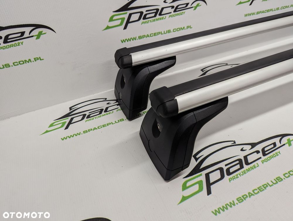 Bagażnik dachowy Thule: belki 869 + Kit dopasowujący 183159 + Stopy 751 - 2