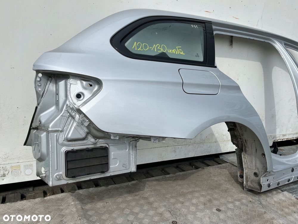Blotnik cwiartka szyba poszycie prawy tyl BMW F11 354 120-130 umFe LADNY - 3