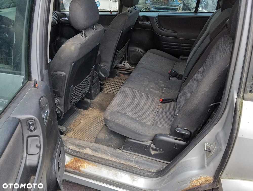 Opel Zafira A FL OPC SPORT (03-05r.) 2.2 CDTI 125KM. Silnik Y22DTR Skrzynia 722.616 (722 616) (722616) lakier 359.Cały na części. GWARANCJA !!!  Przód Tył Zestaw Komplet Drzwi Klapa Zderzak Błotnik Maska Grill Atrapa Szyba Pas Lampa Lusterko Boczki Fotel Kanapa Kokpit Deska Rozdzielcza Przełącznik Włącznik Sterownik Przewody Wiązka Instalacja Moduł Komputer Czujnik Listwa Pompa Alternator Wtryski Głowica Rozrusznik Kompresor Sprzęgło Dwumas Silnik Skrzynia ABS Klimatyzacji Paliwa Wspomagania Kolektor Turbina Przepustnica Zawór Chłodnica Koło Hak Belka Sanki Zawieszenie Mcpherson Półoś Amortyzator Wydech Tłumik Zacisk Most - 7