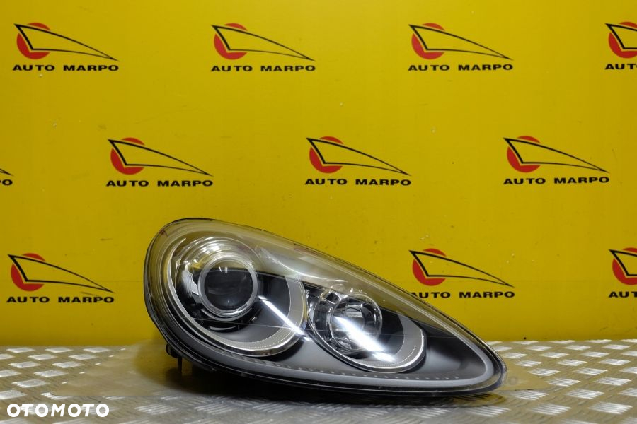 PORSCHE CAYENNE 2011- REFLEKTOR LAMPA ZWYKŁA R USA - 2